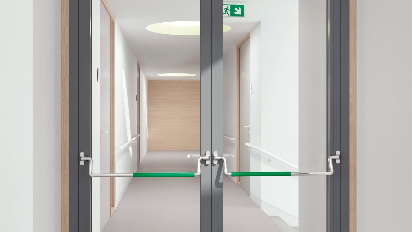 Double glass door equipped with two stainless steel panic bars with green polyamide handle tube