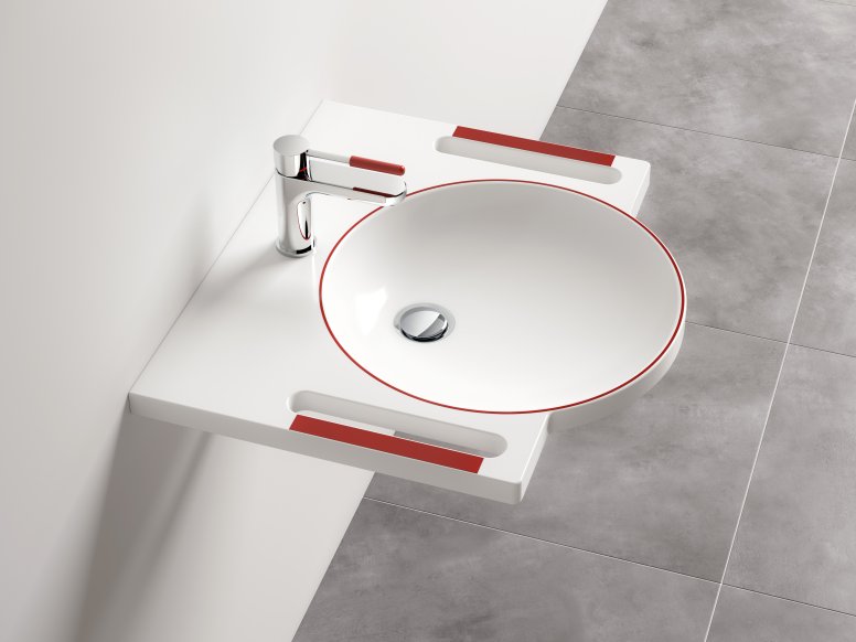 Washbasin and tap with red contrasting colours for dementia patients